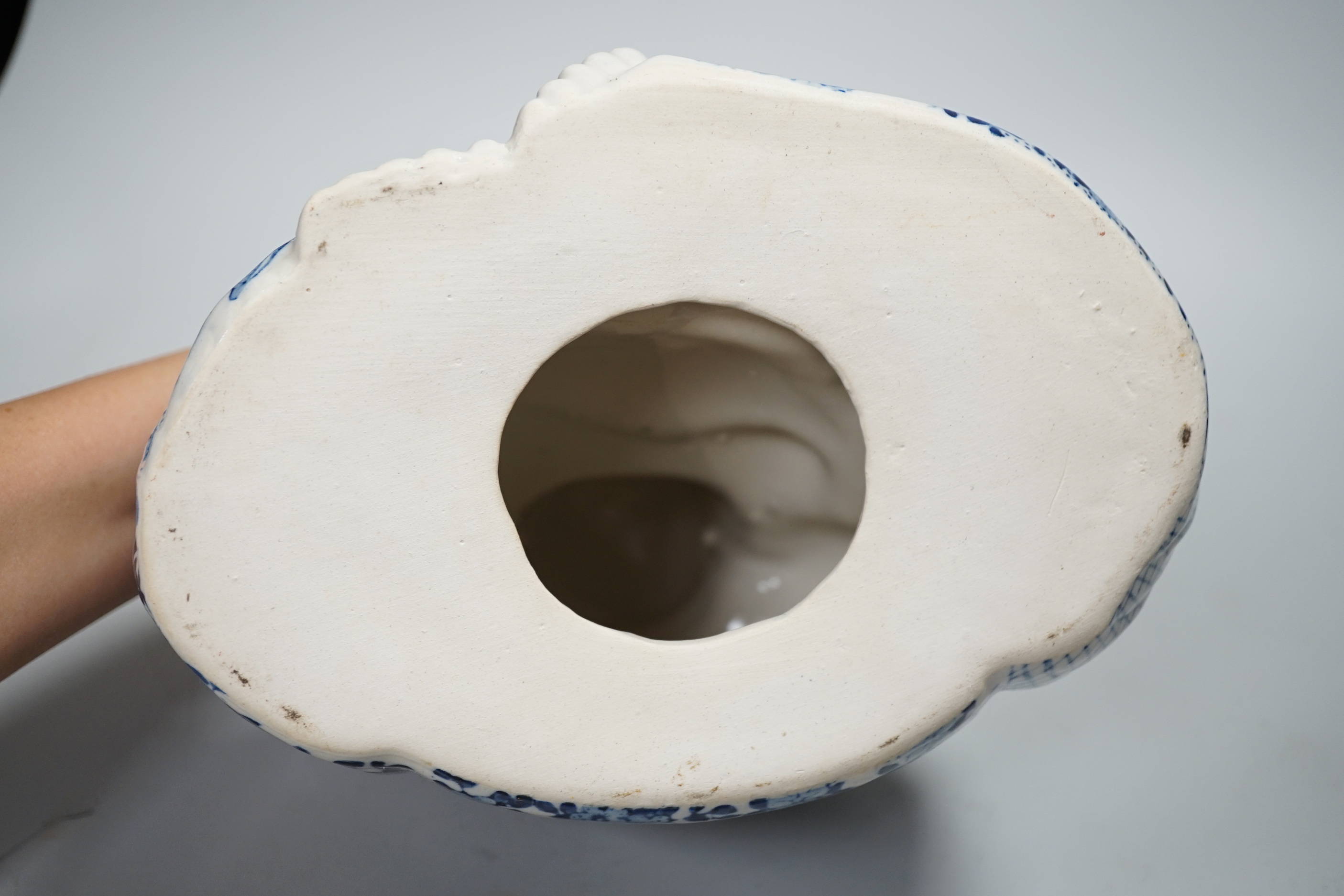 Chinese ceramics including a Buddha, prunus flower ginger jar and plates, the largest 26cm high
